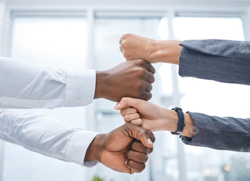 Preview: Shot of two businesspeople stacking their fists on top of each other