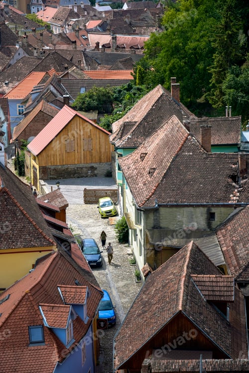 Preview: Old European town with red tiled roofs. Various houses and buildings. Cityscape.