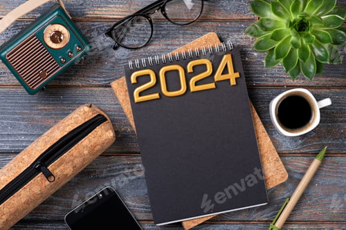 Preview: New year resolutions 2024 on desk. 2024 goals list with notebook, coffee cup, plant on wooden table