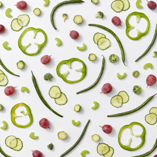 Preview: The pattern of pieces of cucumber, grapes, cabbage and asparagus on a gray background. Organic