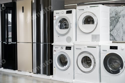 Preview: Row of new washing machines in a hypermarket