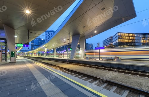Preview: High speed train in motion on the railway station at night