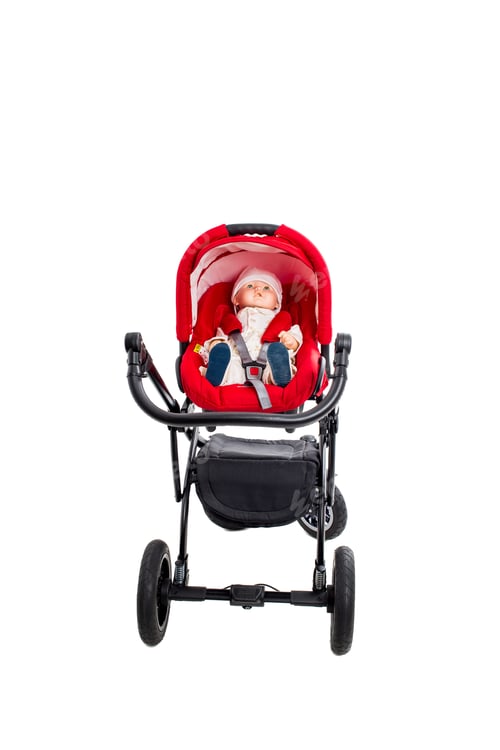 Preview: Infant in Red Stroller on a White Background
