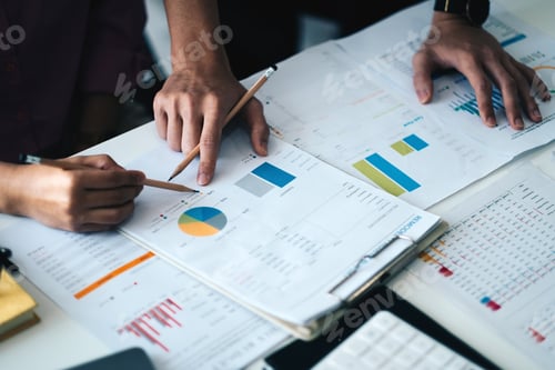 Preview: Financial Business team present. Business man hands hold documents with financial statistic stock