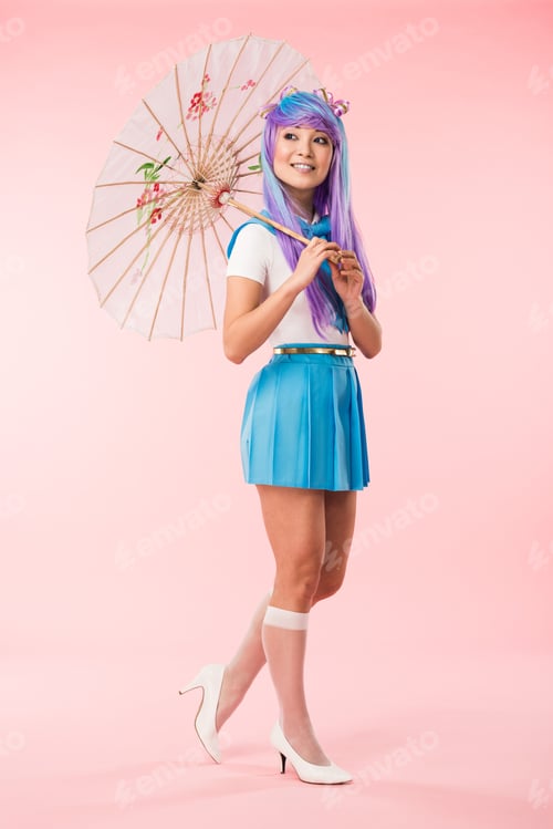 Preview: Full length view of smiling asian anime girl holding paper umbrella on pink