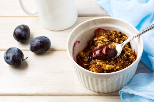 Preview: Plum granola in the white baking ceramic form