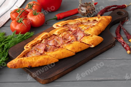 Preview: Close up of Turkish Pide bread on wooden table