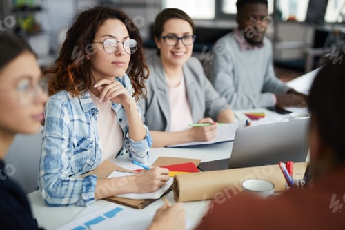 Preview: Row of Business People in Meeting