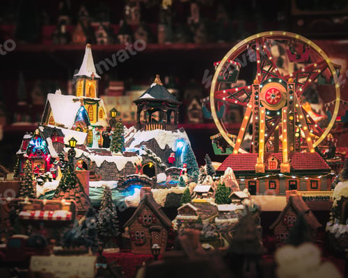 Preview: several small christmas village decorations in front of a ferris wheel