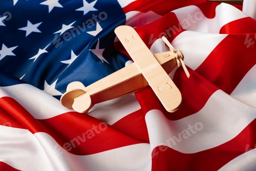 Preview: toy jet plane and flag of USA. creative photo