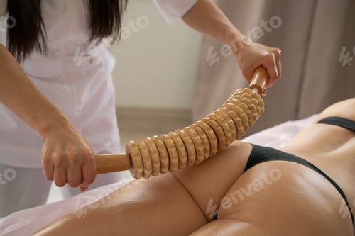 Preview: Close-up on back unidentified woman having anti-cellulite massage session