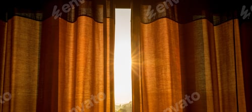 Preview: Curtain with sunlight rays through the gap