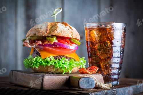 Preview: Homemade and tasty burger with cold drink