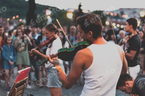 Preview: Music festival in Pragua. The street musicians play the violin on the Charles Bridge in Prague