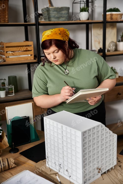 Preview: Elegant woman engages in creativity at a colorful art studio filled with artistic supplies