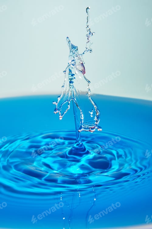 Preview: Abstract background of splash of color water, collision of colored drops, the concept