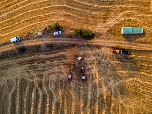 Preview: Top view of farm lands with agricultural machines