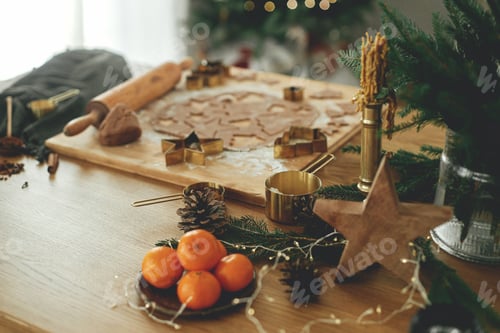 Preview: Gingerbread dough with golden cutters, rolling pin, cooking spices and festive decorations