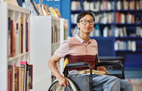 Preview: Asian Man in Wheelchair at School