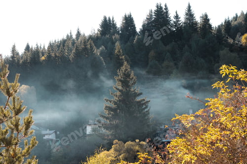 Preview: Misty smoke over the village in the mountain forest