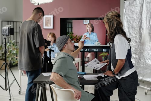 Preview: Director Discussing Props with Director Assistant