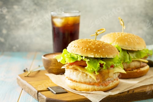 Preview: Fast food. Homemade hamburger with bacon and cola drink
