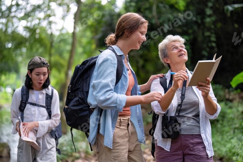 Preview: Backpack tourist travel outdoor adventure bird study using binoculars looking and record to book