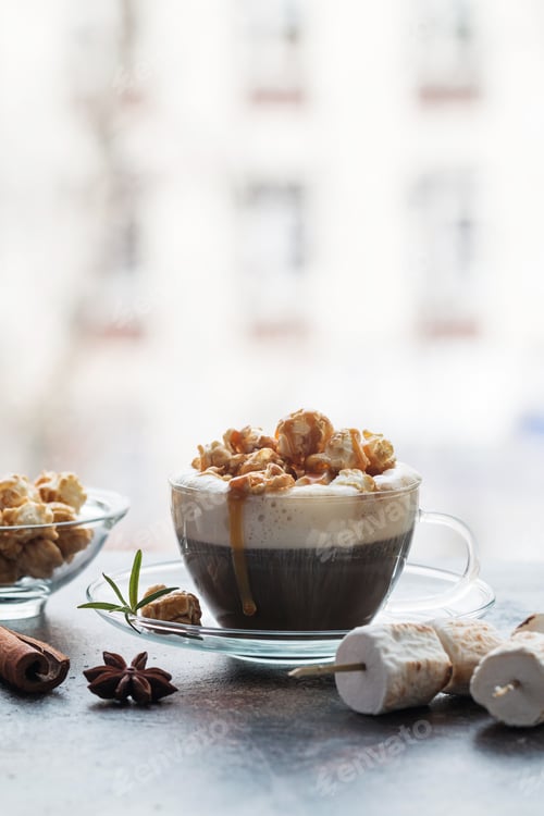 Preview: Glass of coffee with popcorn