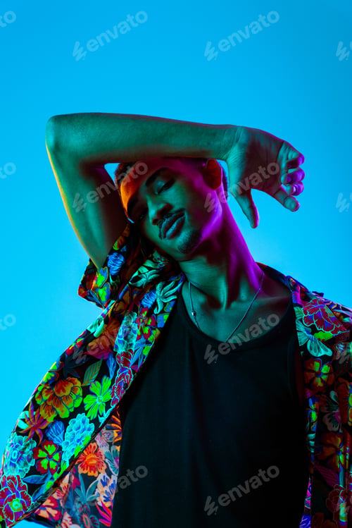 Preview: African man portrait in studio on colorful background
