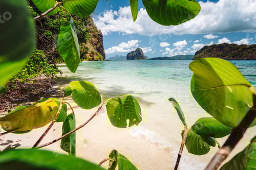 Preview: Philippines, Palawan. Vacation scene of tropical beach scenery with rocky islands and impressive