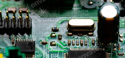 Preview: Close up of components and microchips on PC circuit board.