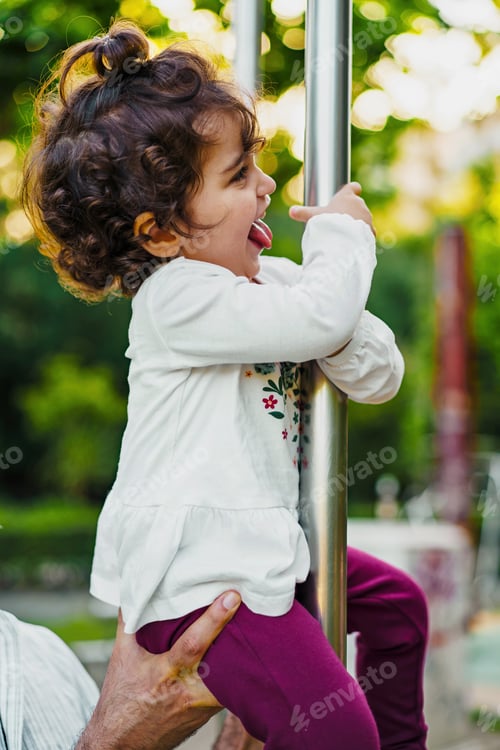 Preview: Happy Toddler Playing at the Park - Fun and Joyful Outdoor Activity
