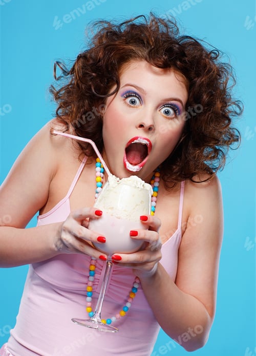 Preview: Portrait Of Beautiful Curly Brunette Girl With The Glass Of Milk Shake
