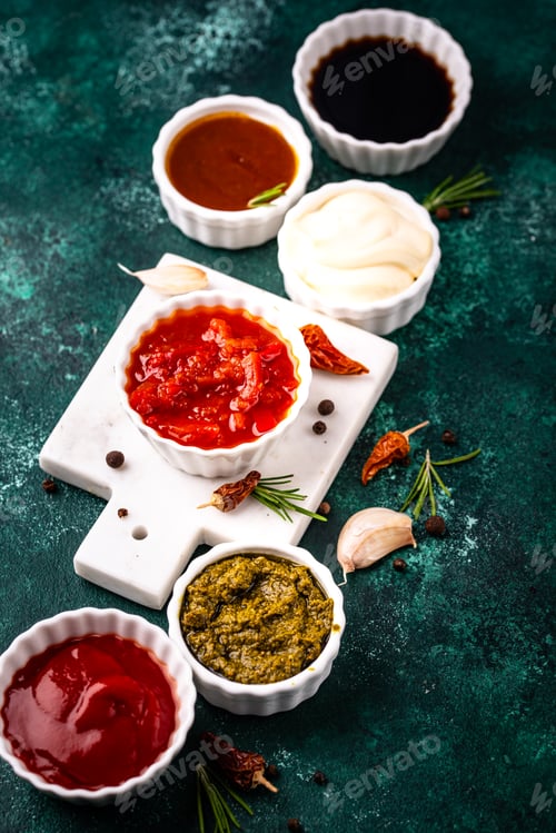 Preview: Set of different sauces. Ketchup, mustard, pesto