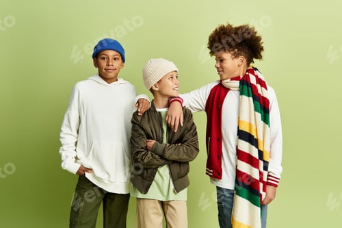 Preview: Charming boys showcase vibrant fashion while celebrating their friendship in a joyful moment