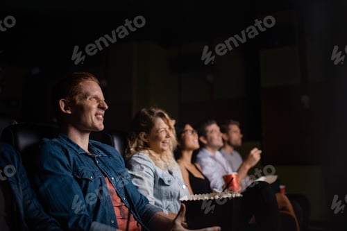Preview: Group of people in multiplex movie theater