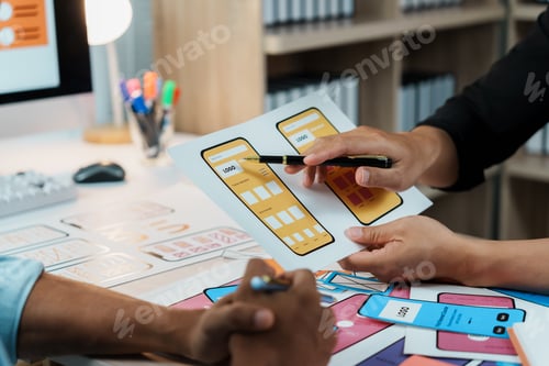 Preview: User experience designers working on wireframes for mobile application development