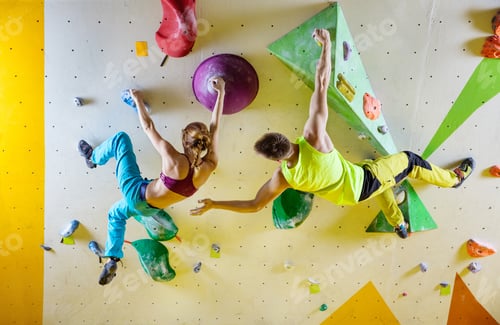 Preview: Rock climbers in climbing gym.
