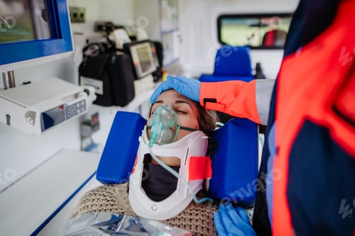 Preview: Close-up of examining patient, preparing her for transport.