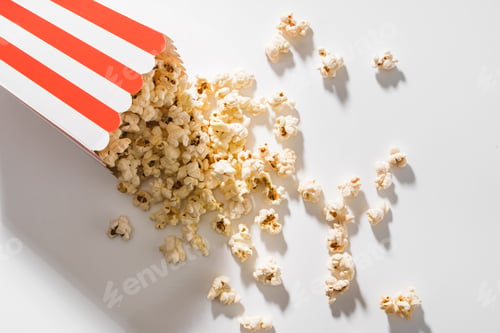 Preview: Classic striped box with delicious popcorn on white background