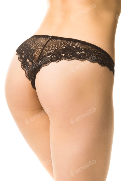 Preview: girl in black lace panties, back view, half-length shot on a white background