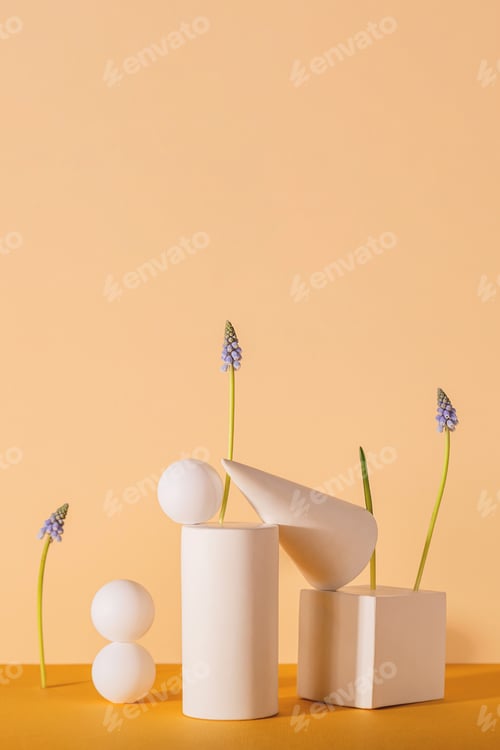Preview: Spring modern still life with geometric shapes and blue muscari flowers on a neutral background.