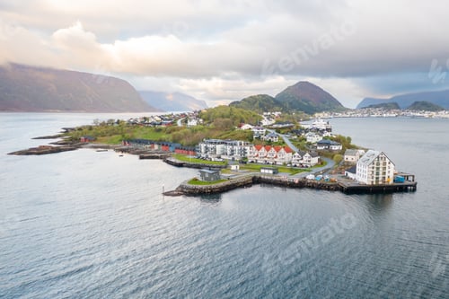 Preview: Alesund townscape with colorful wooden homes by the sea.