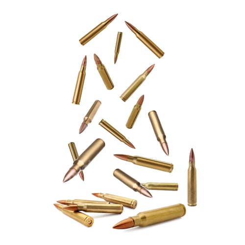Preview: Many bullets falling on white background. Firearm ammunition