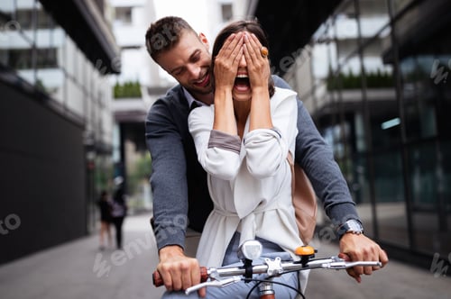 Preview: Smiling happy couple in love having fun together outdoors
