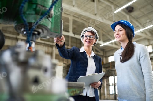 Preview: Optimistic inspectors holding examination in factory