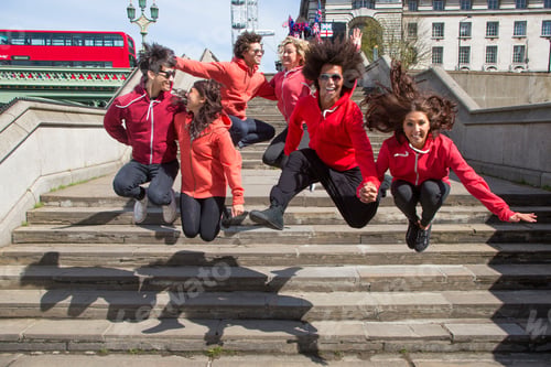 Preview: Small group of dancers mid air over city steps