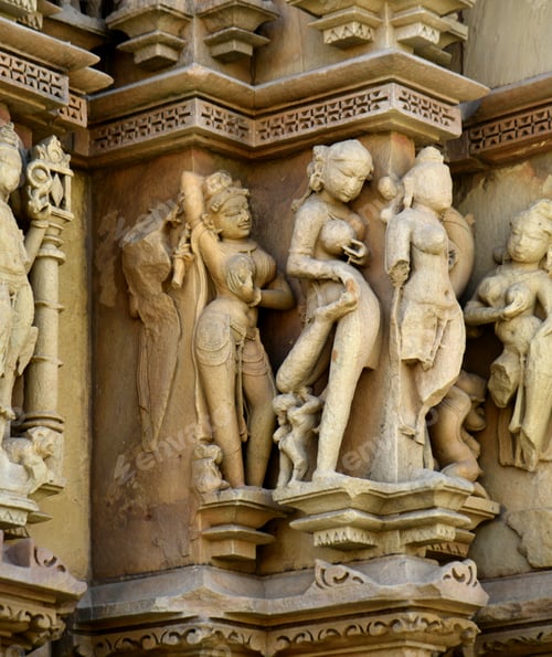 Preview: Sculpture of erotic woman on Khajuraho Temple.