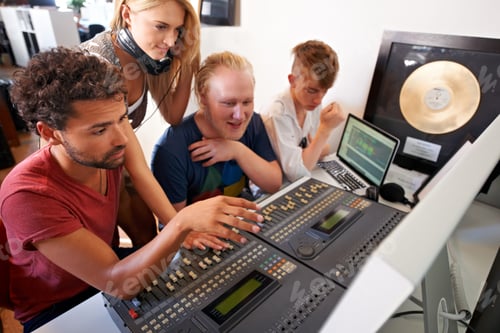 Preview: Team Collaborate at Audio Mixing Board in Studio