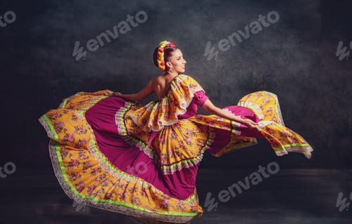 Preview: A woman in a colorful dress is dancing